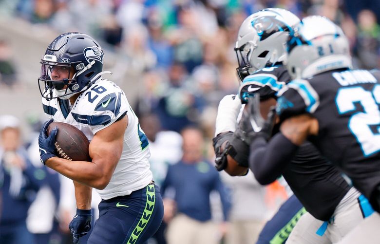 Seattle Seahawks running back Zach Charbonnet rushes the ball against the Carolina Panthers during the first quarter Sunday, Sept. 24, 2023 in Seattle. 225054