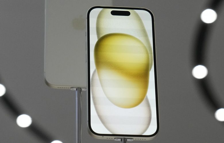 FILE – The iPhone 15 phones are shown during an announcement of new products on the Apple campus in Cupertino, Calif., Tuesday, Sept. 12, 2023. Apple on Saturday, Sept. 30, blamed a software bug some other issues tied to popular apps such as Instagram and Uber for causing its recently released iPhone 15 models to overheat and sparking complaints about being too hot to handle. (AP Photo/Jeff Chiu, File) NYBZ601 NYBZ601