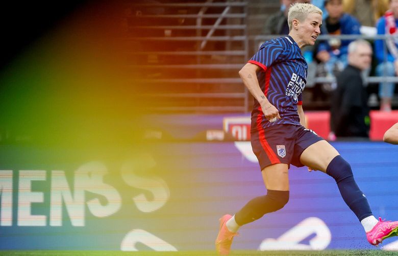 OL Reign forward Megan Rapinoe crosses the ball against the Orlando Pride during the second half at Lumen Field Sunday, Sept. 3, 2023 in Seattle.  224879