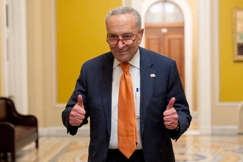 Senate Majority Leader Chuck Schumer, D-N.Y., gives two thumbs up as the Senate votes to approve a 45-day funding bill to keep federal agencies open, Saturday, Sept. 30, 2023, in Washington. (AP Photo/Andrew Harnik) DCAH137 DCAH137