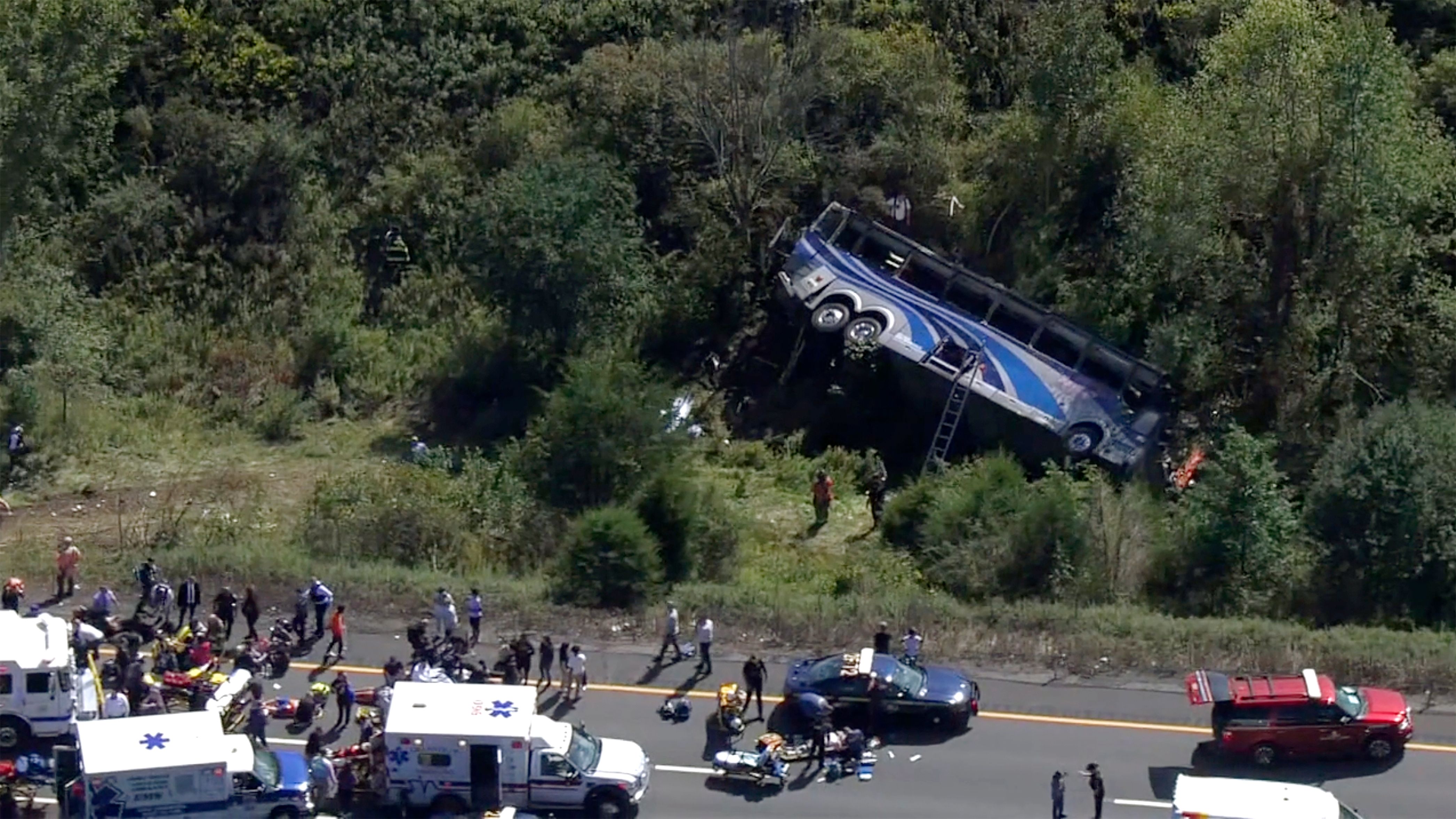 Bus carrying high school students to band camp crashes killing 2