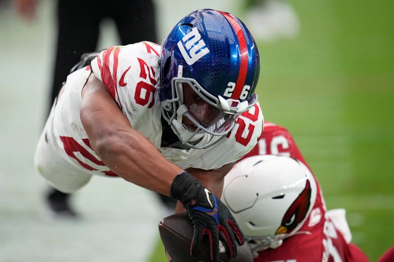 New York Giants running back Saquon Barkley says he has a high ankle sprain, National