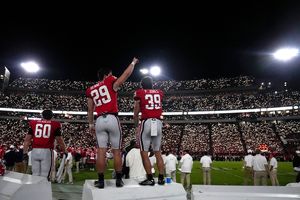 Beck throws and runs for TDs to launch new era as No. 1 Georgia rolls past  UT-Martin 48-7