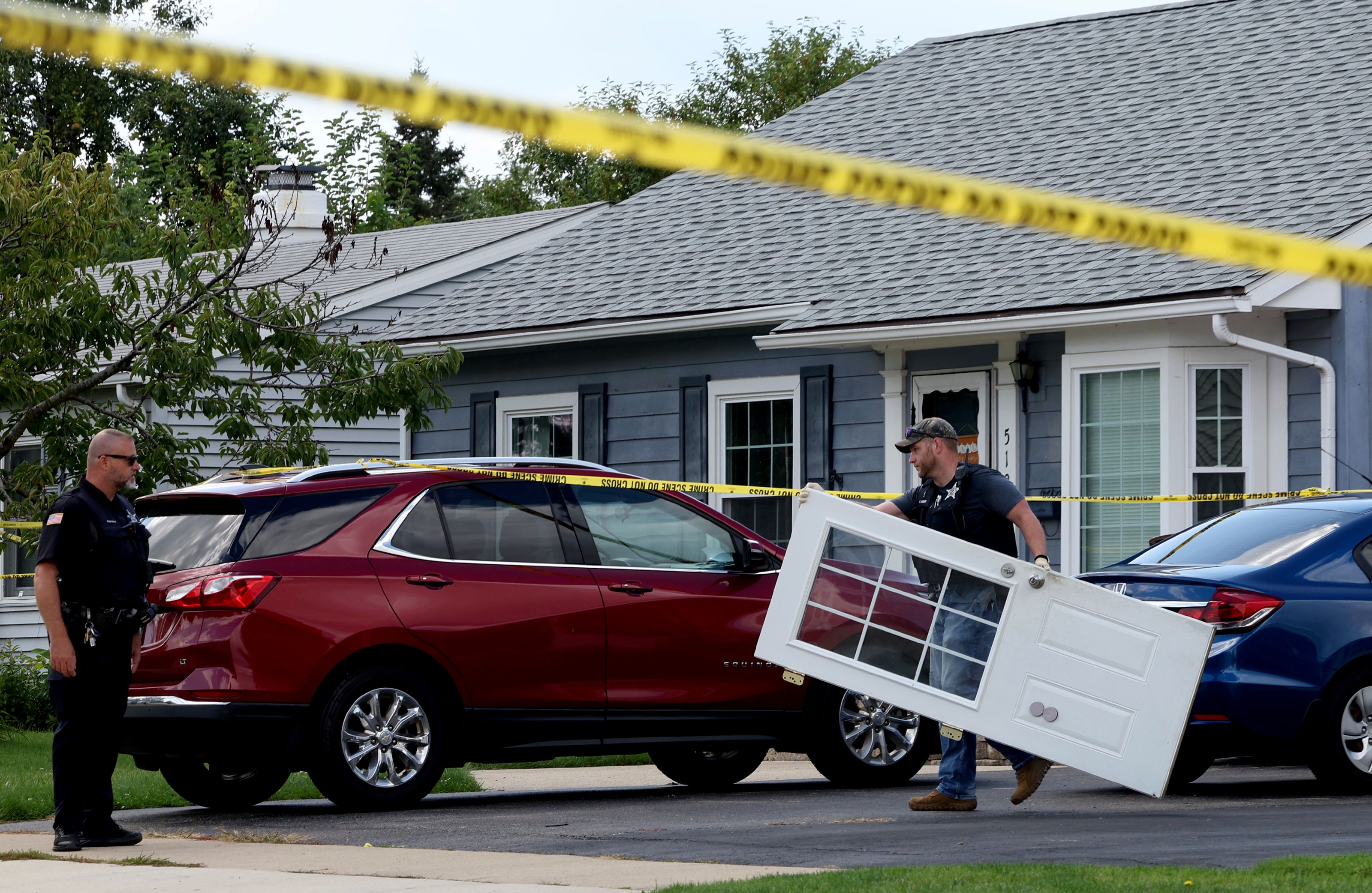 Couple, 2 children and 3 dogs found shot to death in suburban