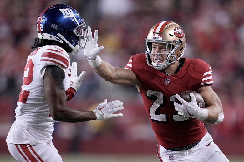 Christian McCaffrey and the 49ers win 13th straight in the regular