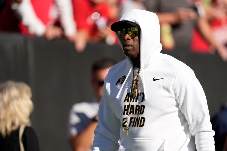 Deion Sanders makes most of rival coach's comments about him always wearing  sunglasses and a hat