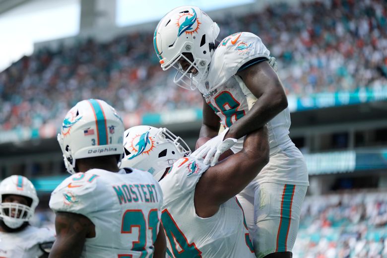 Miami Dolphins score 70 points vs. Broncos in record day - ESPN