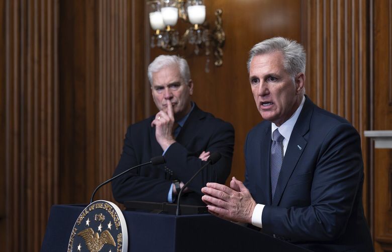 Speaker of the House Kevin McCarthy, R-Calif., joined by Majority Whip Tom Emmer, R-Minn., left, holds a news conference just after the House approved a 45-day funding bill to keep federal agencies open, but the measure must first go to the Senate, at the Capitol in Washington, Saturday, Sept. 30, 2023. (AP Photo/J. Scott Applewhite) DCSA116 DCSA116