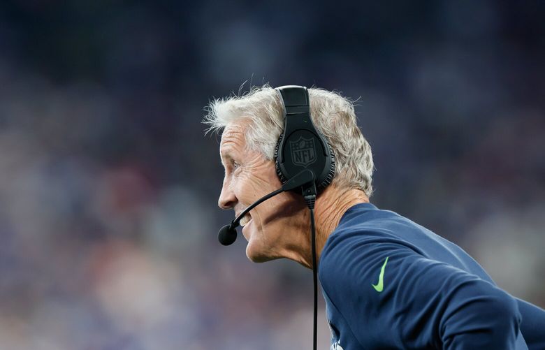 Seattle Seahawks head coach Pete Carroll smiles as he looks out at the field during the first quarter Monday, Oct. 2, 2023 in East Rutherford, NJ. 225107