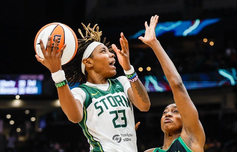 Seattle’s Jordan Horston drives on Minnesota’s Diamond Miller in the second quarter, scoring and reducing the Lynx’s lead to 39-32. 224763