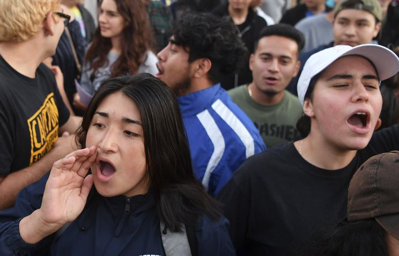 FILE – Protesters shout before a speaking engagement by Ben Shapiro on the campus of the University of California Berkeley in Berkeley, Calif., Sept. 14, 2017. New polling finds that America’s college campuses are seen as far friendlier to liberals than to conservatives when it comes free speech. Polling from the University of Chicago and the AP-NORC Center for Public Affairs Research finds that 47% of adult Americans say liberals are free to express their views on college campuses, while 20% said the same of conservatives. (AP Photo/Josh Edelson, File) WX481 WX481