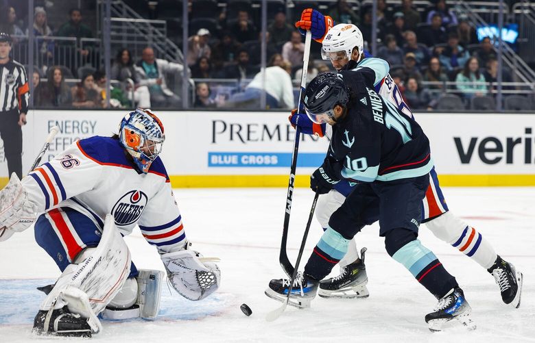 Matty Beniers gets the puck at the top of the crease, but can’t jam the shot past Edmonton goalie Jack Campbell in the first period.  The Edmonton Oilers played the Seattle Kraken in a NHL Exhibition game Monday, Oct. 2, 2023 at Climate Pledge Arena, in Seattle, WA. 225045