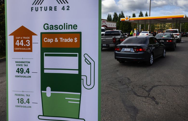 A graphic by Future 42 breaks down costs added to gasoline for Washington drivers. (Ken Lambert / The Seattle Times)