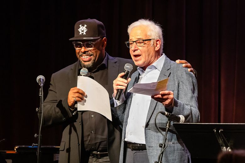 Bassist and composer Christian McBride and Rob Perry, Jazz Alley assistant club manager, at a benefit for musician Julian Priester at Jazz Alley in September. (Lisa Hagen Glynn)