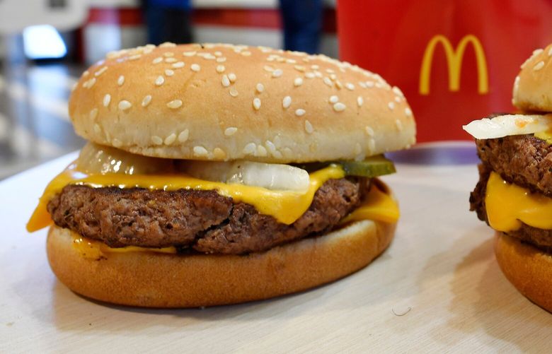 In this March 6, 2018, file photo, a McDonald’s Quarter Pounder in Atlanta. (AP Photo/Mike Stewart, File)