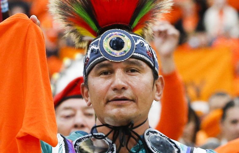 FILE – Wab Kinew attends the second annual Orange Shirt Day Survivors Walk and Pow Wow on National Day for Truth and Reconciliation in Winnipeg, Manitoba, Sept. 30, 2022. The Canadian province of Manitoba has elected the first First Nations premier of a province in Canada. Manitobans elected an NDP government led by Wab Kinew, was raised as a young boy on the Onigaming First Nation in northwestern Ontario, later moving with his family to Winnipeg. (John Woods/The Canadian Press via AP) NYPS201 NYPS201