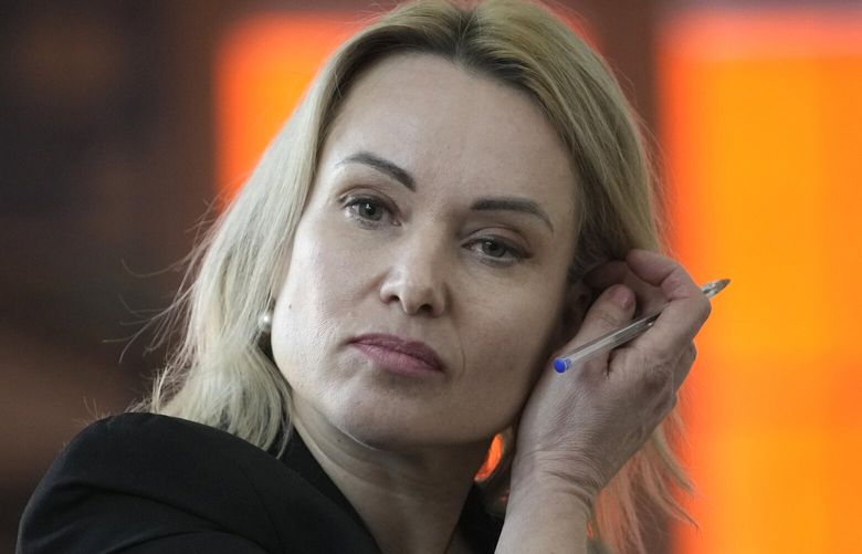 FILE – Former Russian state TV journalist Marina Ovsyannikova attends a press conference Friday, Feb. 10, 2023 in Paris, France. A court in Moscow on Wednesday handed a former state TV journalist a 8 1/2-year prison term in absentia for protesting Russia’s war in Ukraine, the latest in a months-long crackdown against dissent that has intensified since Moscow’s invasion 20 months ago. (AP Photo/Christophe Ena, File) XDL101 XDL101