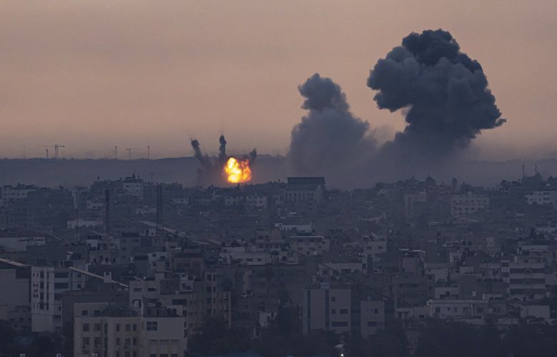 Smoke rises after the Israeli air strike in the Gaza Strip on Monday, Oct. 9, 2023. Israel’s military battled to drive Hamas fighters out of southern towns and seal its borders Monday as it pounded the Gaza Strip. (AP Photo/Fatima Shbair) DV121 DV121