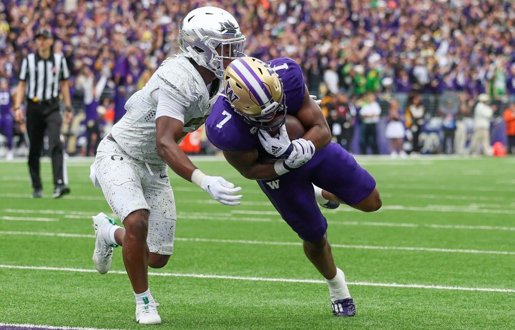 Oregon's Jordan James scores 10-yard rushing touchdown giving Ducks a 33-29  lead over Washington