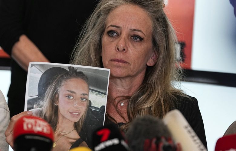 Keren, mother of Mia Schem and representatives of the families of the abducted and missing persons held by Hamas militants in Gaza hold a press conference following the release of a video by Hamas, in which the 21-year-old Israeli woman is seen. Schem was among the roughly 200 people kidnapped in Hamas’ cross-border attack on Oct. 7. in Tel Aviv, Israel, Tuesday, Oct. 17, 2023. (AP Photo/Ohad Zwigenberg) XOB104 XOB104