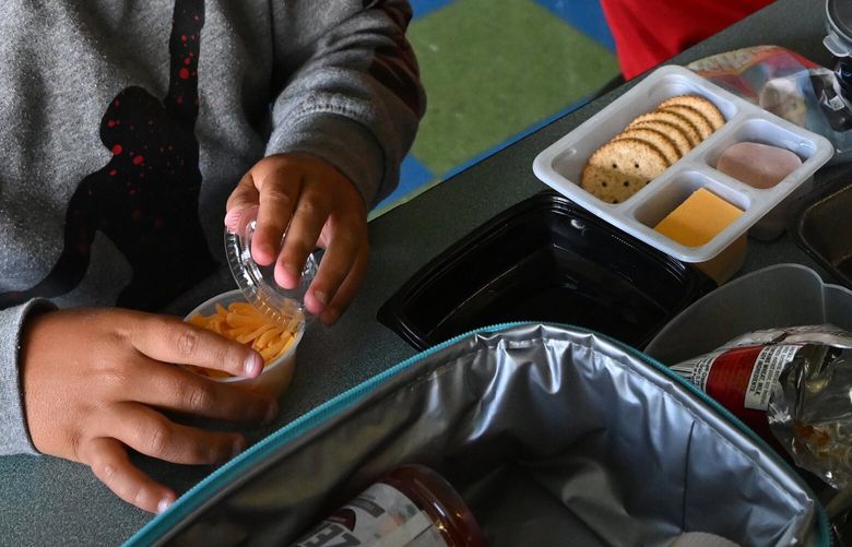 A student eats Lunchables during lunch at Pembroke Elementary School. The school has been serving Lunchables as a lunch choice for students this school year.