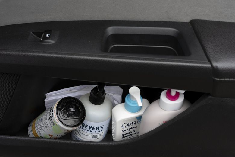 Lotions and soaps inside the door of Chrystal Audet’s car in Kirkland, Wash. (Ruth Fremson / The New York Times)