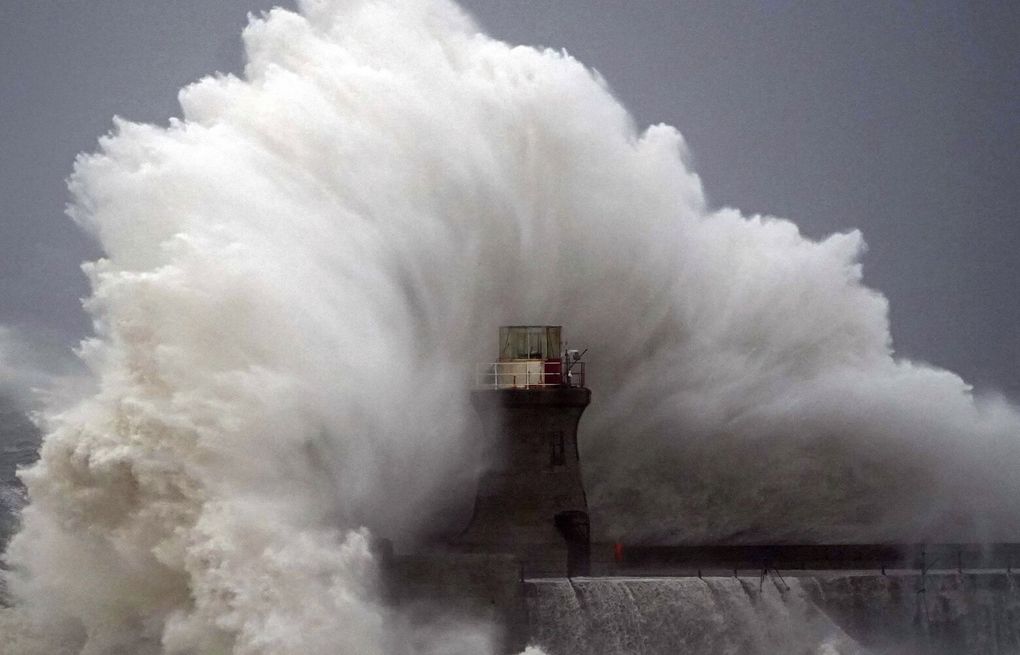 Gale-force winds and floods strike Northern Europe. At least 1