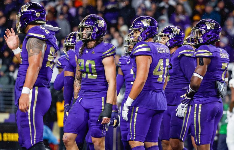 Washington’s defense stands stunned after Arizona State scores in the second quarter.  The Arizona State Sun Devils played the 5th-ranked University of Washington Huskies Saturday, October 21, 2023 at Husky Stadium, in Seattle, WA. 225278