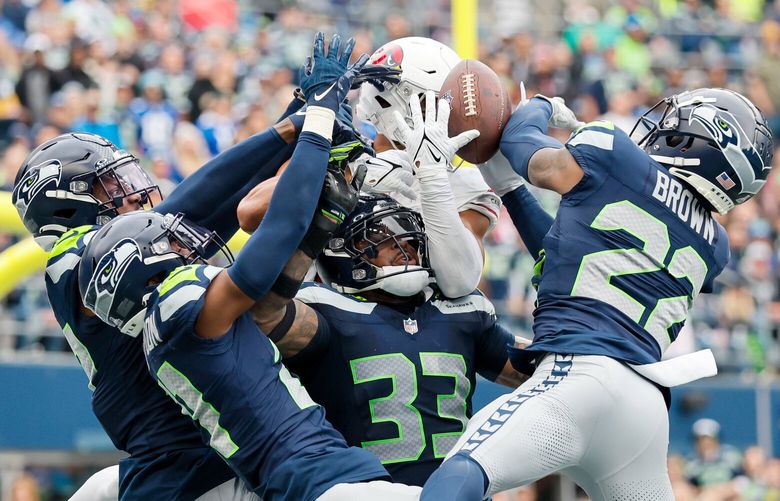 The Seattle Seahawks defense including safety Jamal Adams (33) break up a deep pass at the very end of the first half Sunday, Oct. 22, 2023 in Seattle. 225286
