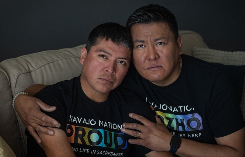 From left, Brennen Yonnie and Alray Nelson are banned from marrying in the Navajo Nation, where both grew up and would like to wed. MUST CREDIT: Sharon Chischilly for The Washington Post