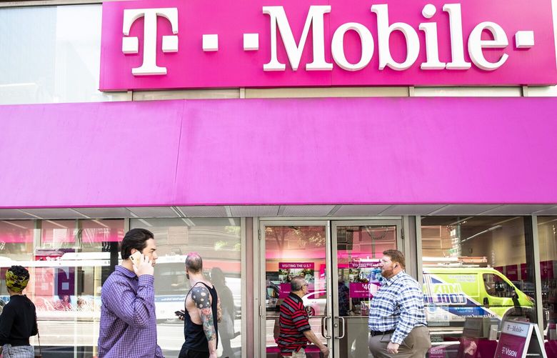 A T-Mobile store in New York, June 11, 2019. A group of attorneys general from nine states and the District of Columbia filed a federal lawsuit on Tuesday in a bid to block a proposed merger between the wireless carriers T-Mobile and Sprint, a $26 billion deal that has yet to receive the Justice Department’s approval. (Brittainy Newman/The New York Times)