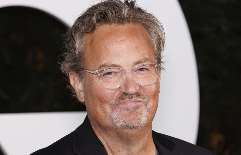 FILE – Matthew Perry arrives at the GQ Men of the Year Party on Thursday, Nov.17, 2022, in West Hollywood, Calif. Perry, who starred as Chandler Bing in the hit series “Friends,” has died. He was 54. The Emmy-nominated actor was found dead of an apparent drowning at his Los Angeles home on Saturday, according to the Los Angeles Times and celebrity website TMZ, which was the first to report the news. Both outlets cited unnamed sources confirming Perry’s death. His publicists and other representatives did not immediately return messages seeking comment. (Photo by Willy Sanjuan/Invision/AP, File) GAAK602 GAAK602