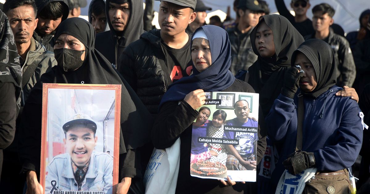 One year after deadly fan crush at Indonesia soccer stadium, families