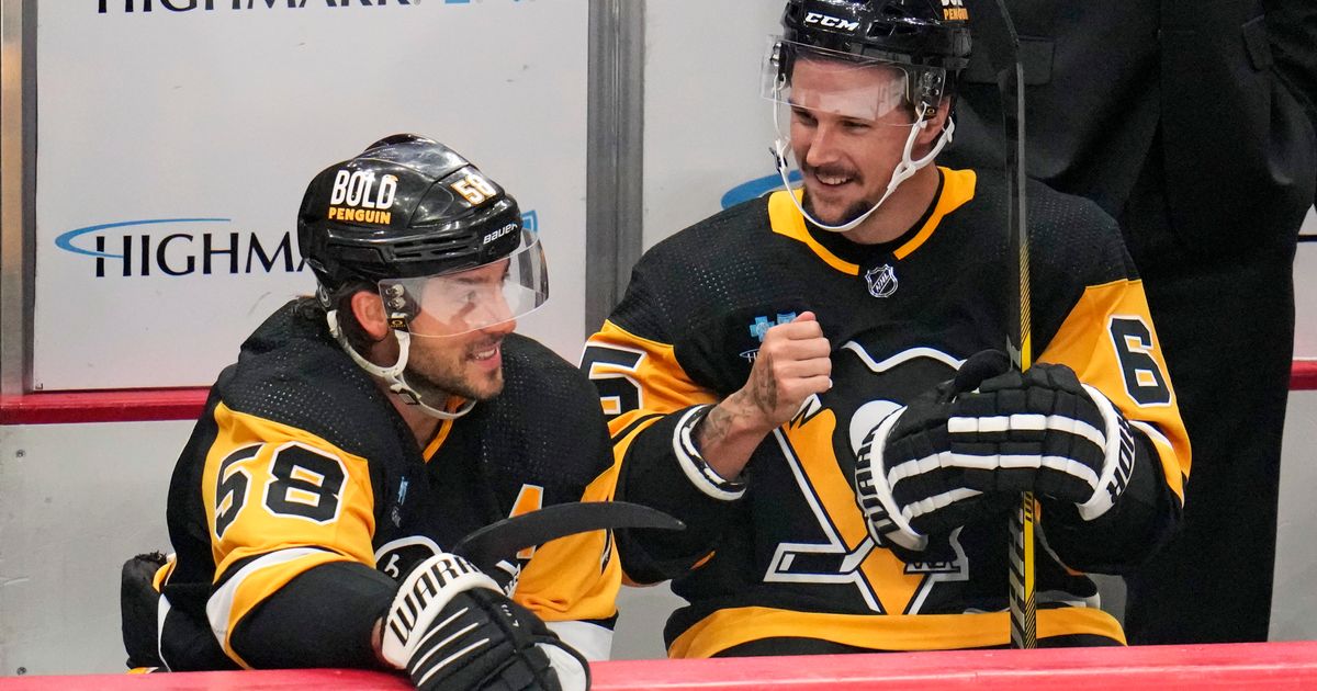 IN PHOTOS: Erik Karlsson sports Penguins threads as he joins his