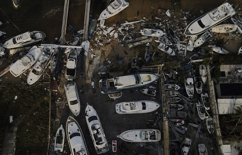 Damage is seen at a yacht club in the aftermath of Hurricane Otis in Acapulco, Mexico, Saturday, Oct. 28, 2023. (AP Photo/Felix Marquez) XFLL106 XFLL106