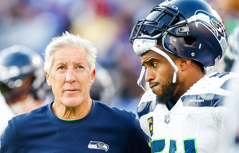 Pete Carroll and Bobby Wagner look at the big screen to see the game get away in the fourth.  The Seattle Seahawks played the Baltimore Ravens Sunday, Nov. 5, 2023 at M&T Bank Stadium, in Baltimore, MD. 225401
