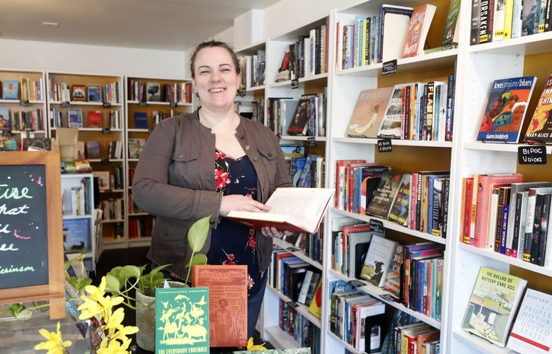 Maren Commendant (CQ) is the owner of Nook & Cranny Books + More on 15th Street E. on Capitol Hill.  223448