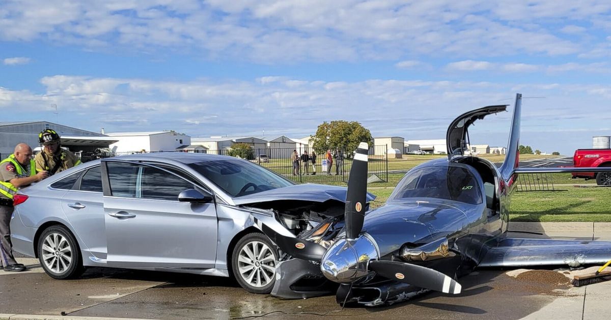 Small plane crashes into car during emergency landing in North