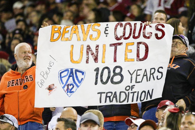 Beaver fans hold a sign