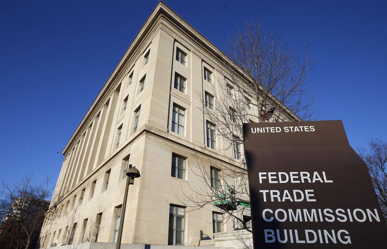 FILE –  A sign stands outside the Federal Trade Commission building, Jan. 28, 2015, in Washington. (AP Photo/Alex Brandon, File) 