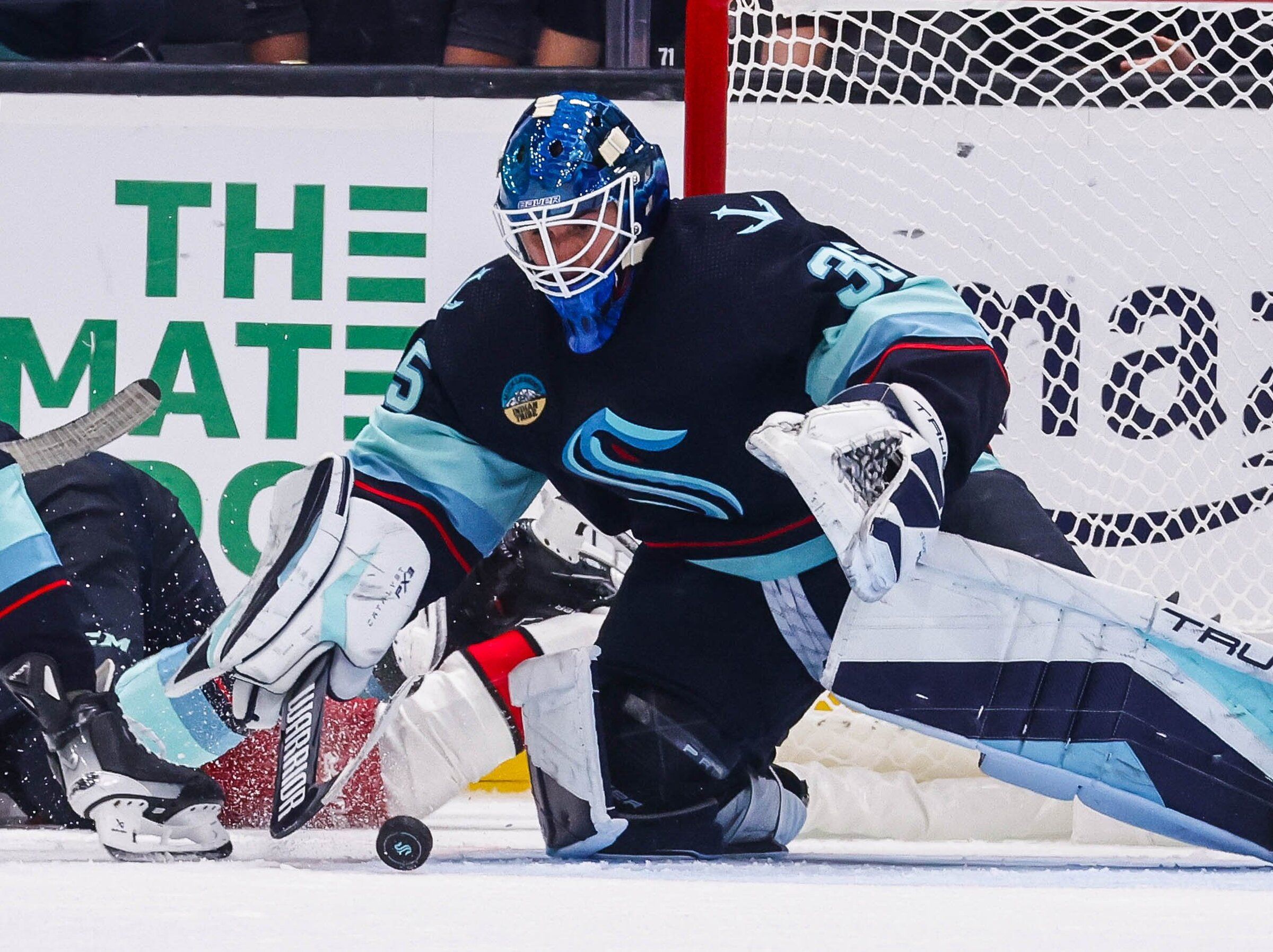 Kraken skaters adjusting to goalie Joey Daccord's bold