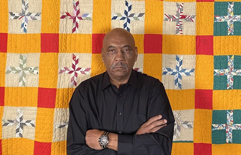 Jim Tharpe’s great-great grandmother Mollie Barnes made this quilt, along with others in Tharpe’s possession. They are called Underground Railroad quilts and contain messages and symbols used to help enslaved Black people make their way to freedom. Barnes was enslaved in Tennessee and passed the quilts down the family line. (Carlton Winfrey / The Seattle Times)