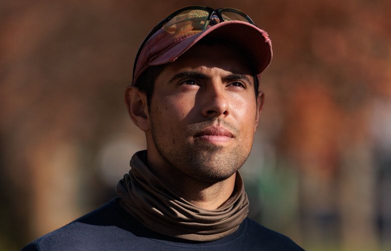 A portrait of Alex Quintana, 30, a mentor with Big Brothers Big Sisters, is taken in Bellevue, Wash. Friday, Nov. 17, 2023.  225439