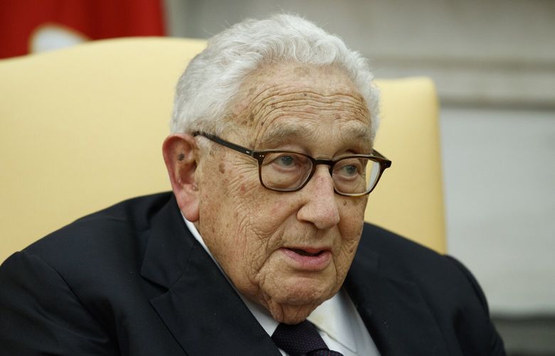 FILE – Former Secretary of State Henry Kissinger speaks during a meeting with President Donald Trump in the Oval Office of the White House, Oct. 10, 2017, in Washington. Kissinger, the diplomat with the thick glasses and gravelly voice who dominated foreign policy as the United States extricated itself from Vietnam and broke down barriers with China, died Wednesday, Nov. 29, 2023. He was 100. (AP Photo/Evan Vucci, File) WX601 WX601