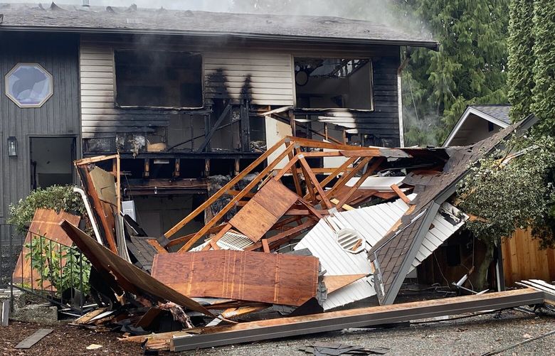 A suspected gas explosion destroyed a house in Bothell Wednesday, according to firefighters, just two days after it sold.