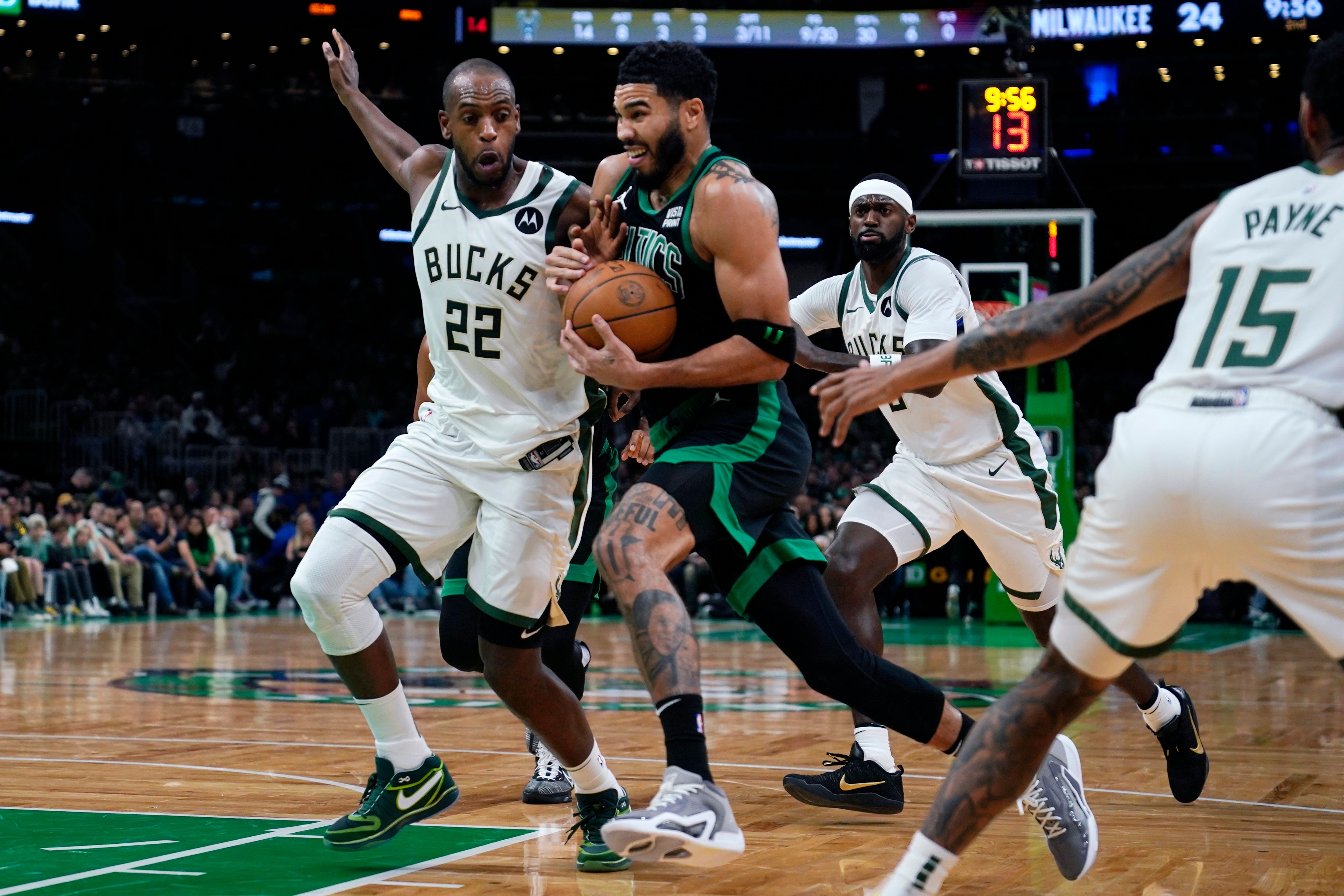 Tatum shakes off illness helps Celtics slow Giannis and beat