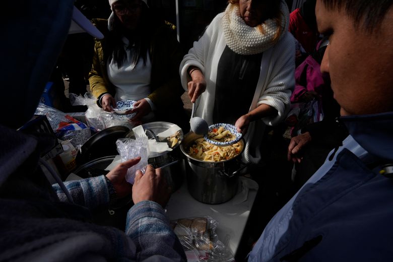 Overcrowding, cold food, uncertain futures a way of life for migrants in  Chicago's shelters