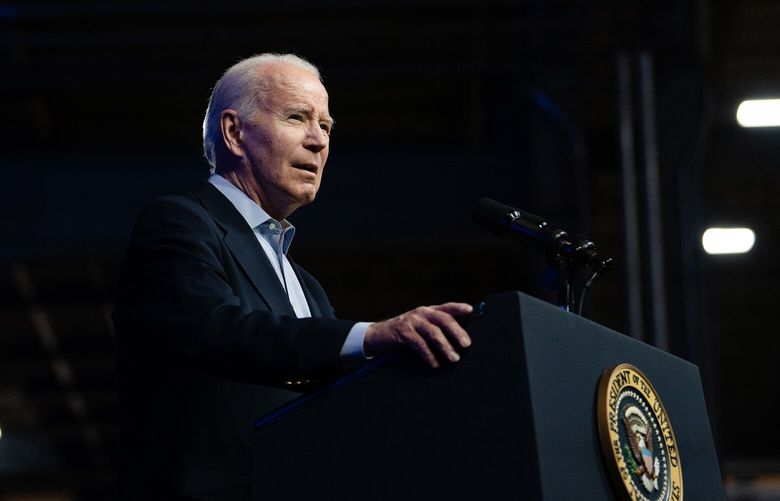 FILE – President Joe Biden delivers remarks at a wind turbine manufacturing operation in Pueblo, Colo., on Nov. 29, 2023.  At a campaign fundraiser on Dec. 5, Biden said his decision to run for re-election was driven largely by his determination to prevent Donald Trump from returning to power. “If Trump wasn’t running, I’m not sure I’d be running,” he told donors. (Erin Schaff/The New York Times) XNYT0453 XNYT0453