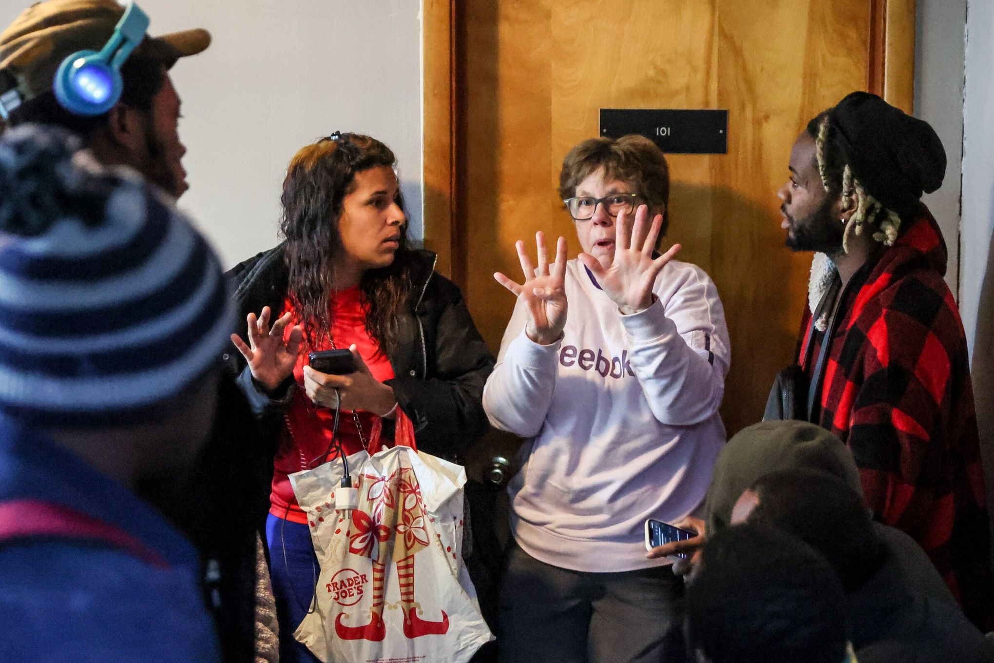 A year into crisis, Tukwila church struggles as 500 asylum-seekers face  winter