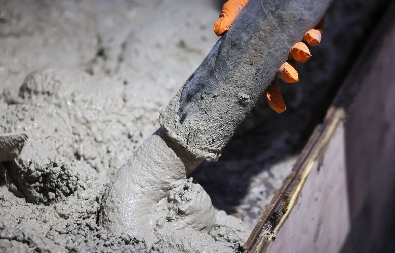 Zero-carbon C Crete is poured Wednesday morning in northeast Seattle, Washington on October 11, 2023. 225040